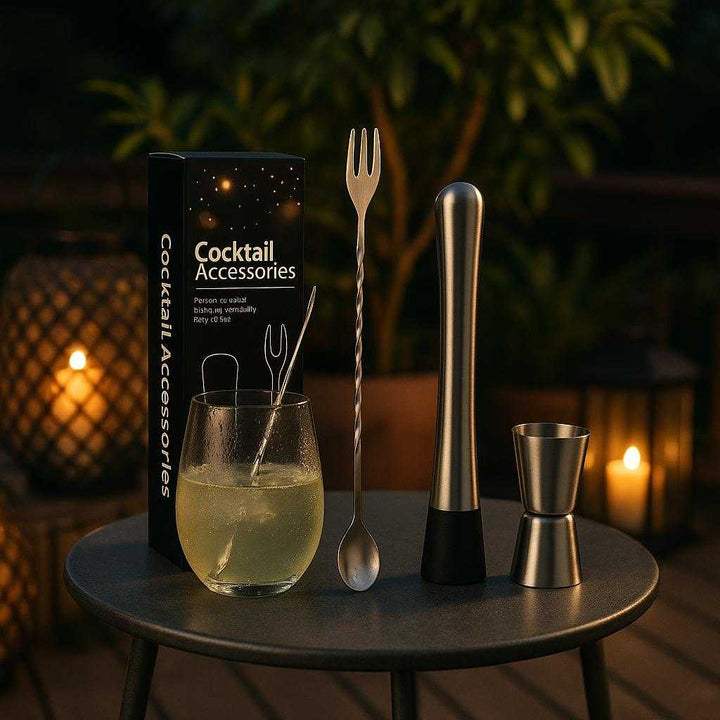Cocktail Mixer Sæt i Rustfrit Stål, Plastik og metal - 3 Dele, Premium Kvalitet: A different realistic outdoor patio setting where the cocktail mixer set is securely positioned on a small round metal table, being naturally placed after use during a party.