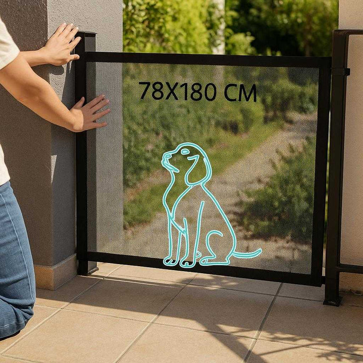 Hundehegn 78x180 cm – Foldbart og justerbart sikkerhedshegn til kæledyr i sort: A different realistic outdoor patio where the dog fence is securely positioned on a tiled surface, used to block off a garden area.