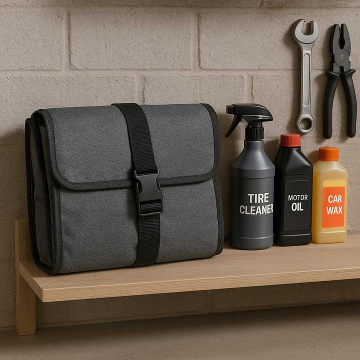 Hundesæde til bil - Foldbar, Vandtæt og Sikker - Grå og Sort Farve: A different realistic home garage setting where the Hundesæde til bil is neatly folded and stored on a shelf next to car maintenance tools.