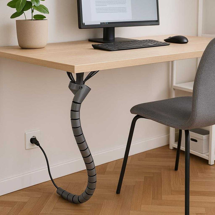 Kabelstyring – Fleksibel Kabelsok i Grå og Sort Plast til Effektiv Ledningsskjul. Generate a lifestyle image that should match environment with for this product 'Kabelstyring – Fleksibel Kabelsok i Grå og Sort Plast til Effektiv Ledningsskjul' with features , make it look realistic and well integrated in the environment