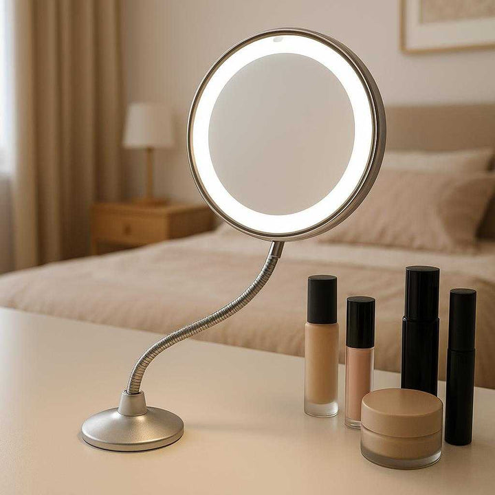 Makeup Spejl med LED Lys og Fleksibel Arm – Professionel Belysning til Præcis Makeupanvendelse: A different realistic vanity setting in a well-lit bedroom, where the mirror is attached to a smooth vanity tabletop.