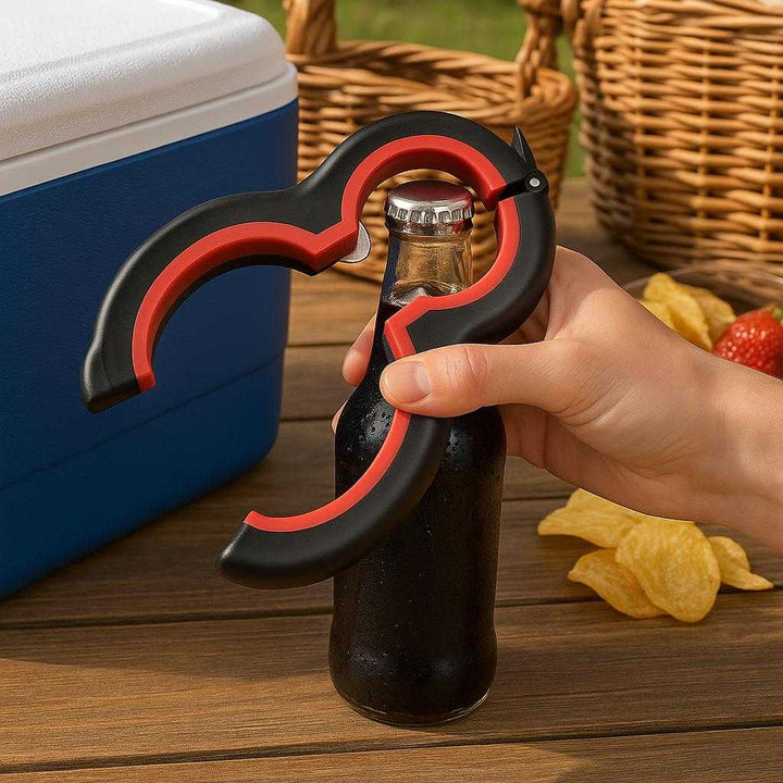 Multiåbner til Nem Åbning af Flasker og Dåser i Sort og Rød - Ergonomisk Design med Høj Kvalitet: A different realistic picnic table setting where the multi-opener is securely positioned next to a cooler, being used to open a bottle of soda.
