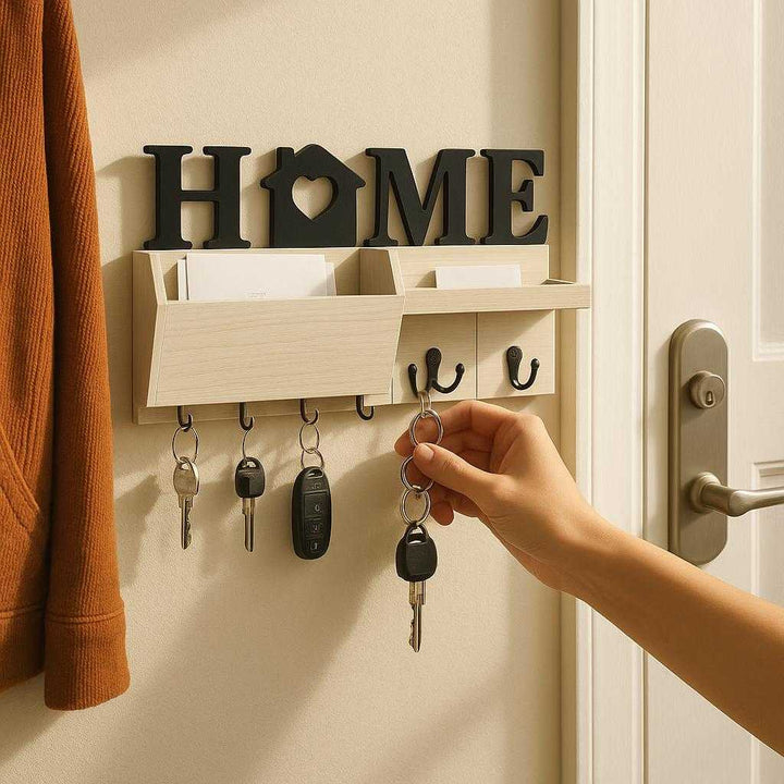 Nøgleholder med Bakke og Kroge i Brun, Sort og Hvid - Stilfuld Opbevaring til Væg: A realistic entryway setting where the key holder with shelf and hooks is properly grounded on a wall beside the front door, being actively used with keys hanging from the hooks and letters in the tray.