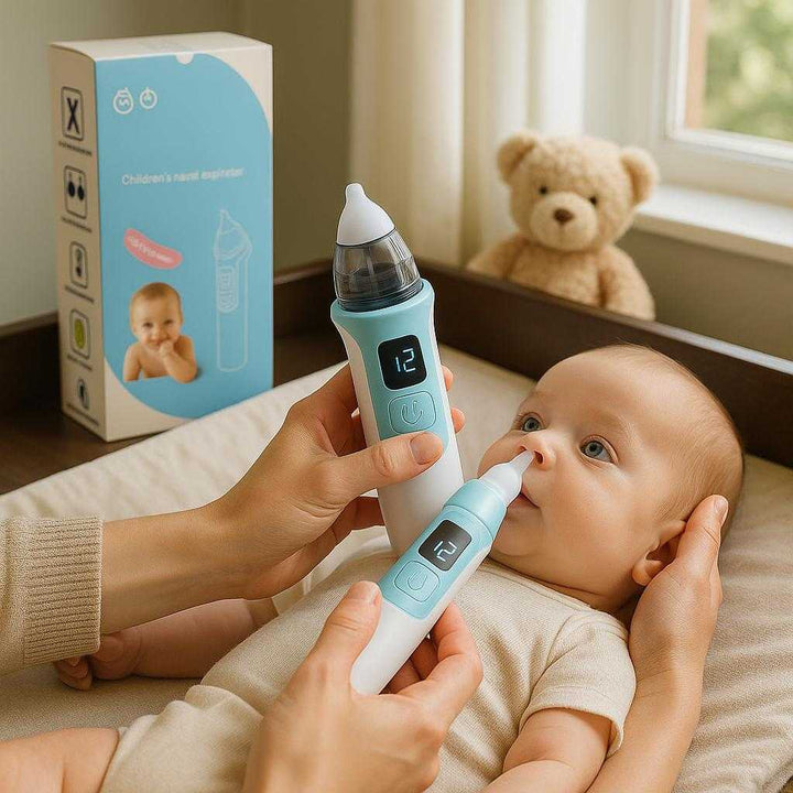 Næsesuger til Babyer med LED - Hvid og Lyseblå Elektrisk Komfort: A realistic nursery setting where the nasal aspirator is properly grounded on a changing table, being actively used by a parent to soothe a calm baby.