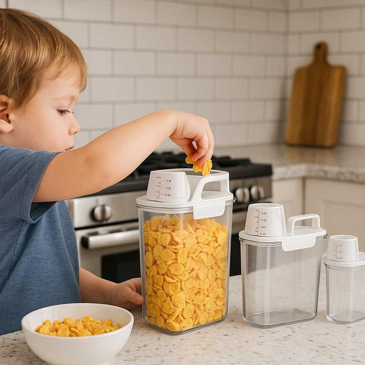 Opbevaring til Vaskepulver - Høj Kvalitet Beholdere med Tætsluttende Låg i 1000 ML, 1800 ML, 2300 ML: A different realistic kitchen setting where the product is securely positioned on a marble countertop, being used as a cereal container, with a child reaching for breakfast cereal inside, showcasing proper physics, shadows, and realistic integration into the environment.