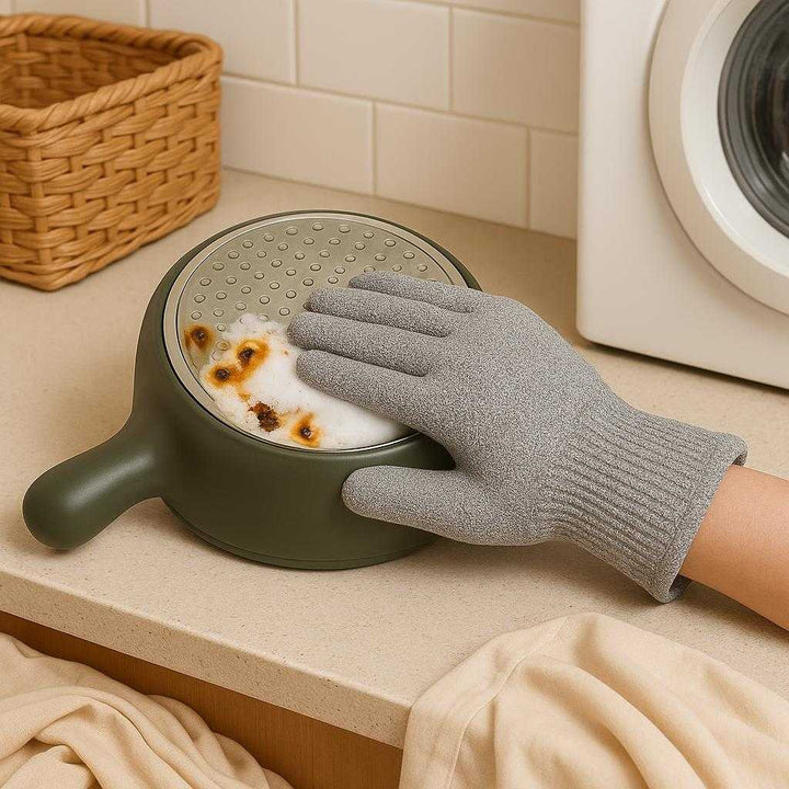 Ståltråds opvaskhandsker i metaltråd og syntetisk fiber, beskytter hænderne, S - 1 stk, M - 1 stk, L - 1 stk: A different realistic laundry room setting where the glove is securely positioned on a counter next to a washing machine, used to handle delicate laundry items being sorted and prepped for a wash.
