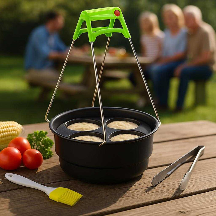 Tilbehørssæt til Airfryer - Optimeret Rundt Design i Høj Kvalitet med Modulære Funktioner: A different realistic outdoor barbecue setup, where the air fryer accessory set is securely positioned on a sturdy wooden picnic table, being naturally placed with grilling tongs and a silicone brush nearby.