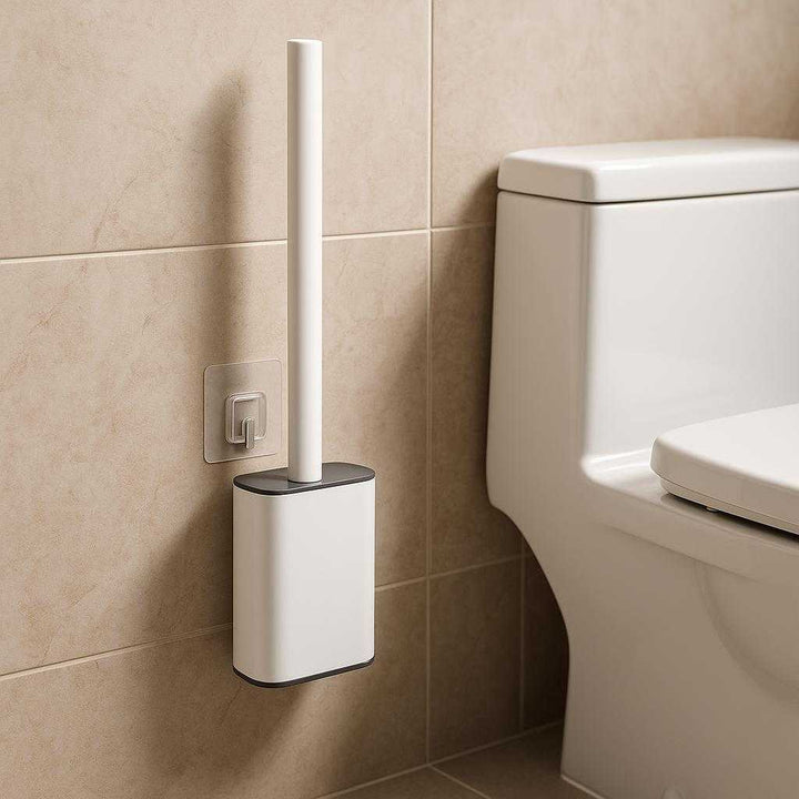 Toiletbørste i Silikone til Effektiv Rengøring - Bakteriehæmmende og Moderne Design: A different realistic bathroom environment where the silicone toilet brush is securely positioned on a wall-mounted holder next to the toilet, highlighting its modern design.